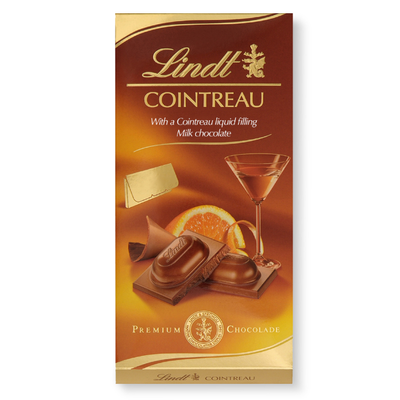 Шоколад молочный Lindt Cointreau с апельсиновым ликером Куантро, 100г 15206 фото